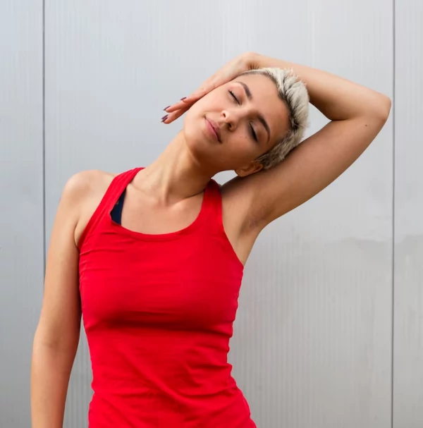 How Physiotherapy Treatments Can Help with Thoracic Outlet Syndrome - young-woman-stretching-outside_23-2148291328